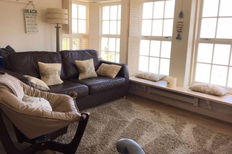 Situated in the heart of the village, within metres of the sea and sandy beach.