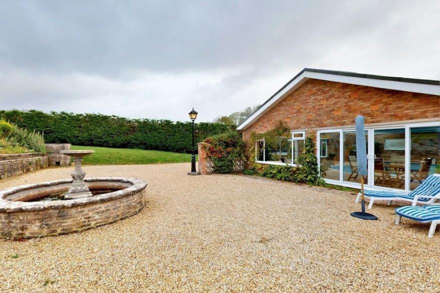 Apartment with own indoor heated pool, sauna + snooker room in Swanage.