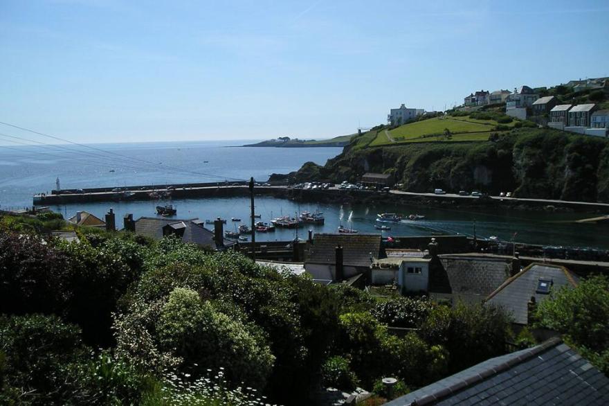 Perfect south facing cottage overlooking Mevagissey Harbour and across the bay.