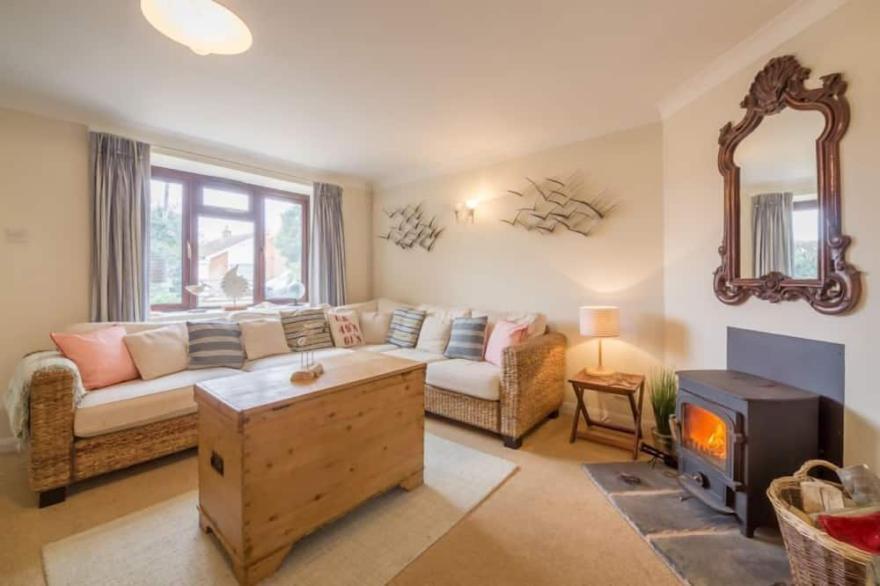 A beautifully presented four-bedroom holiday home near Holme Beach.
