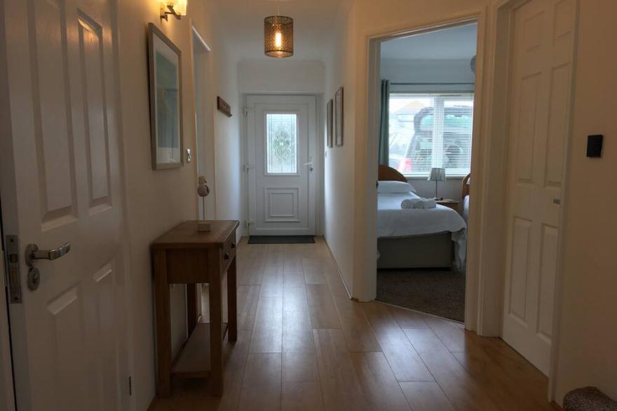 Peaceful Residential Location. Parking For 2 Cars. Sea Views. Walk To Beaches.