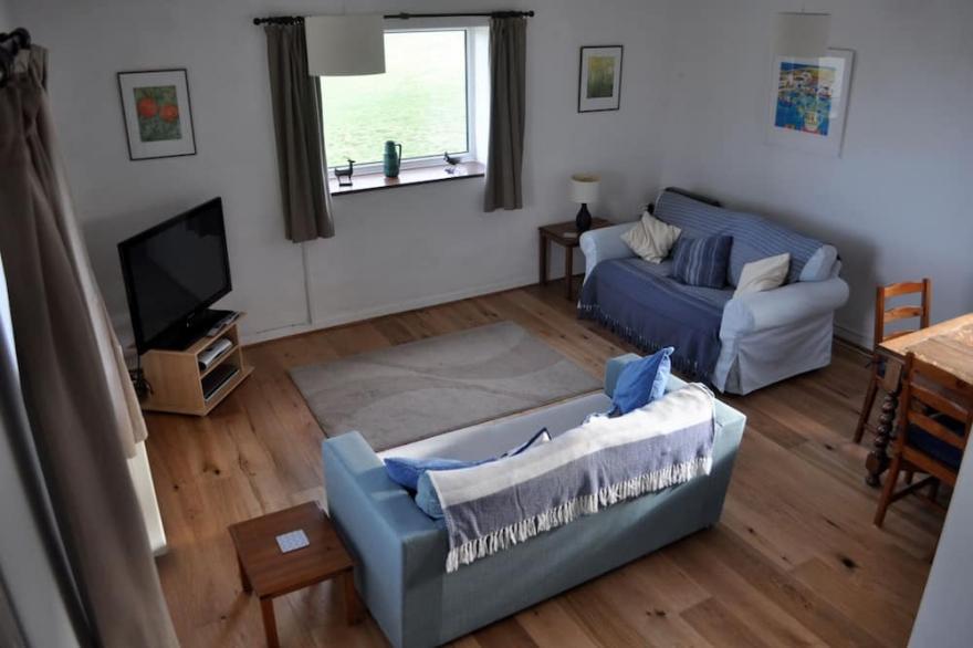 Peaceful coastal property with large garden. Unbeatable views of  sea and moors.