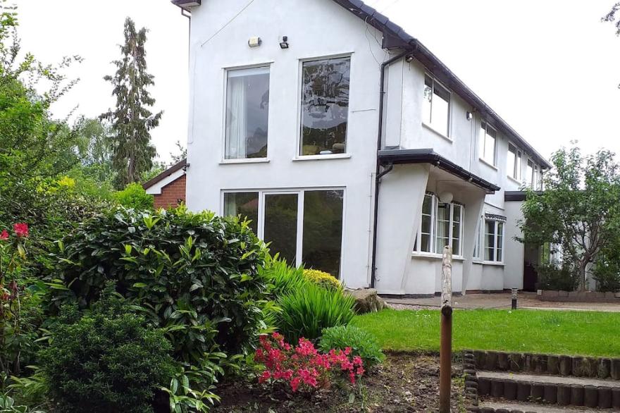 Luxury, ground floor, garden apartment in a leafy Stockport suburb