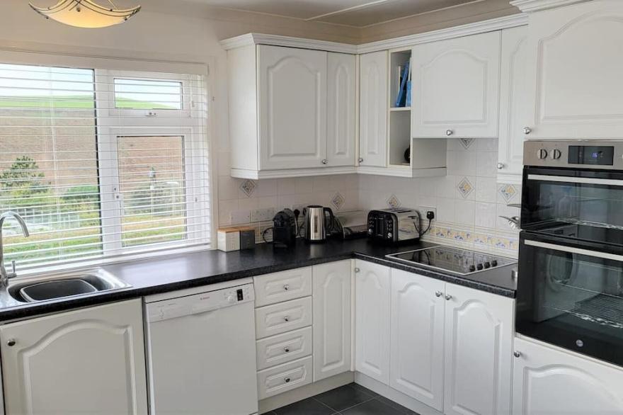 Cottage In Sought After Seaside Location with Parking and great views