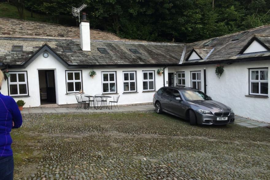 Fellside Luxury Cottage with parking. Lake views River Garden and court yard.