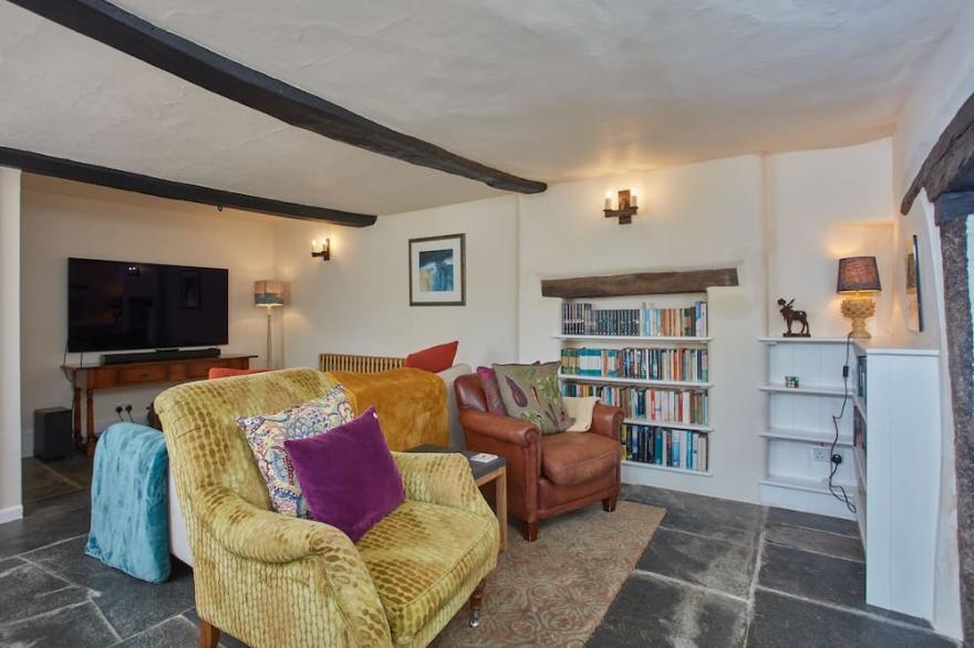 Nestled down just off the South West coast path, The North Wing of this beautiful old farmhouse is t