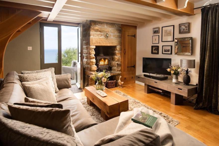 BAY VIEW COTTAGE - stunning cottage overlooking Robin Hoods Bay