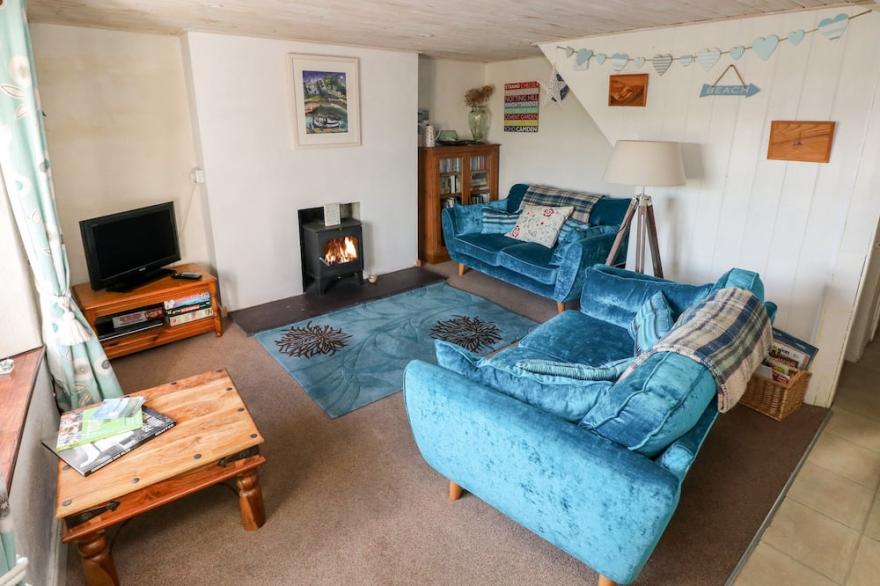 2 STRAND COTTAGES, pet friendly, with open fire in Laugharne