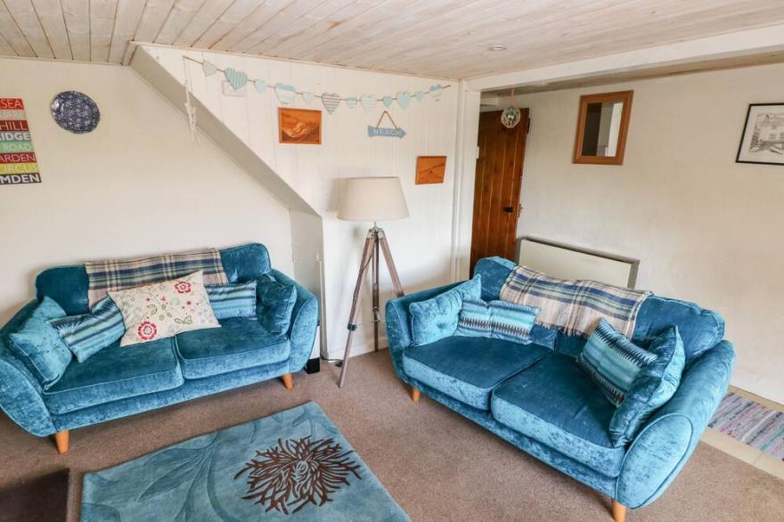 2 STRAND COTTAGES, pet friendly, with open fire in Laugharne