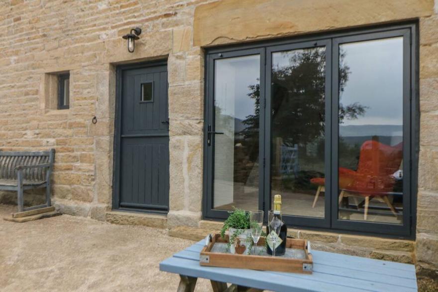 THE BARN, pet friendly, with a garden in Holme, Yorkshire