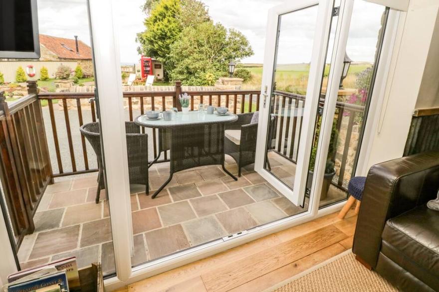 THE HAYSHED, pet friendly, character holiday cottage in Hawsker