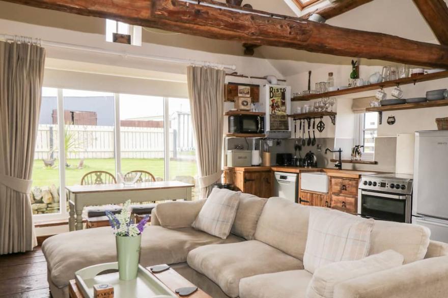 THE COWSHED, pet friendly, character holiday cottage in Hawsker