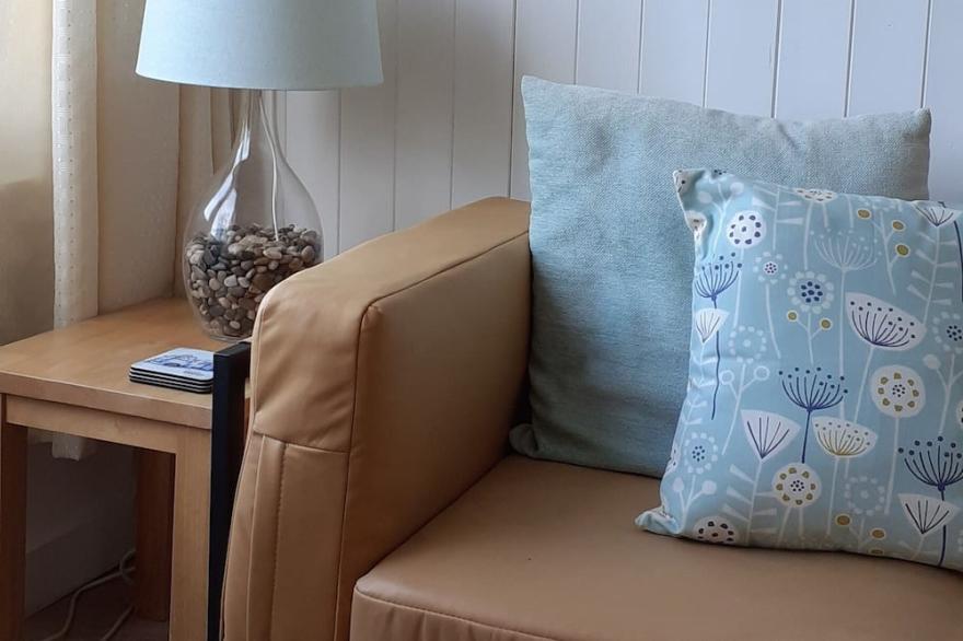 Lovely bright bungalow, tasteful coastal interior.