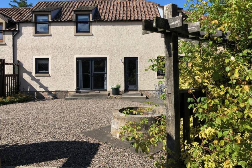 A beautiful recently renovated modern but homely cottage by St Andrews.