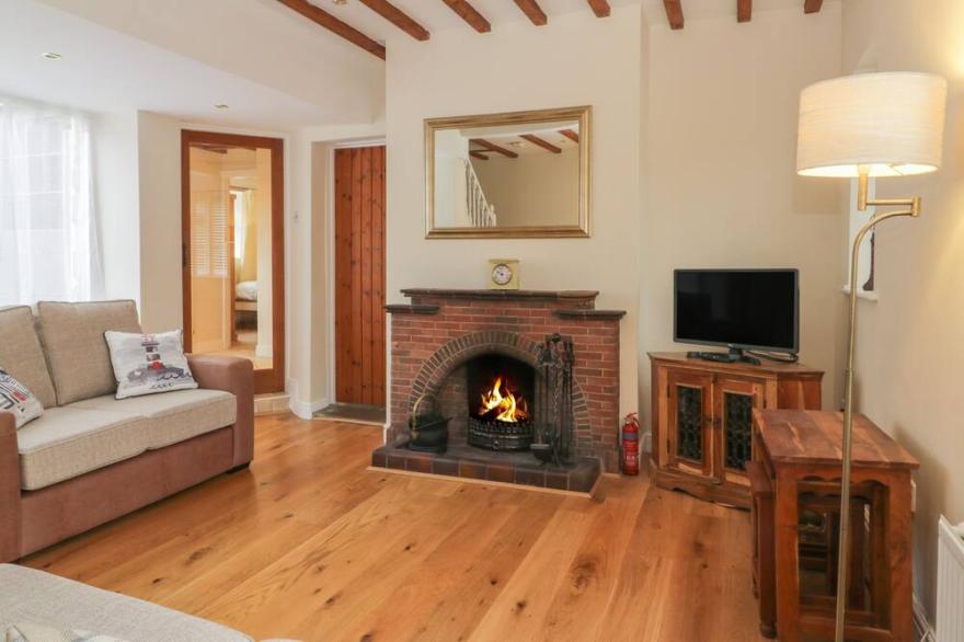 WYKE LODGE COTTAGE, pet friendly, with open fire in Staintondale