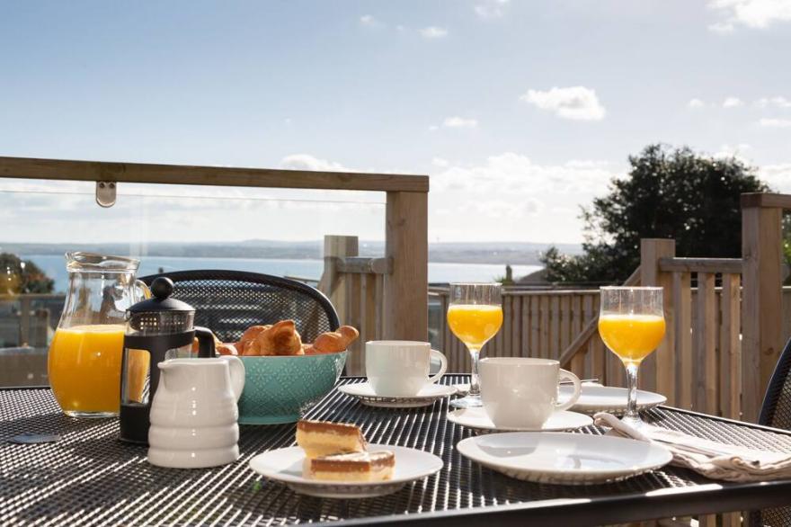 Panoramic views with parking.  Modern house and interior, refurbished in 2022!