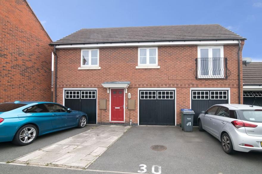 Lovely two bed house with parking