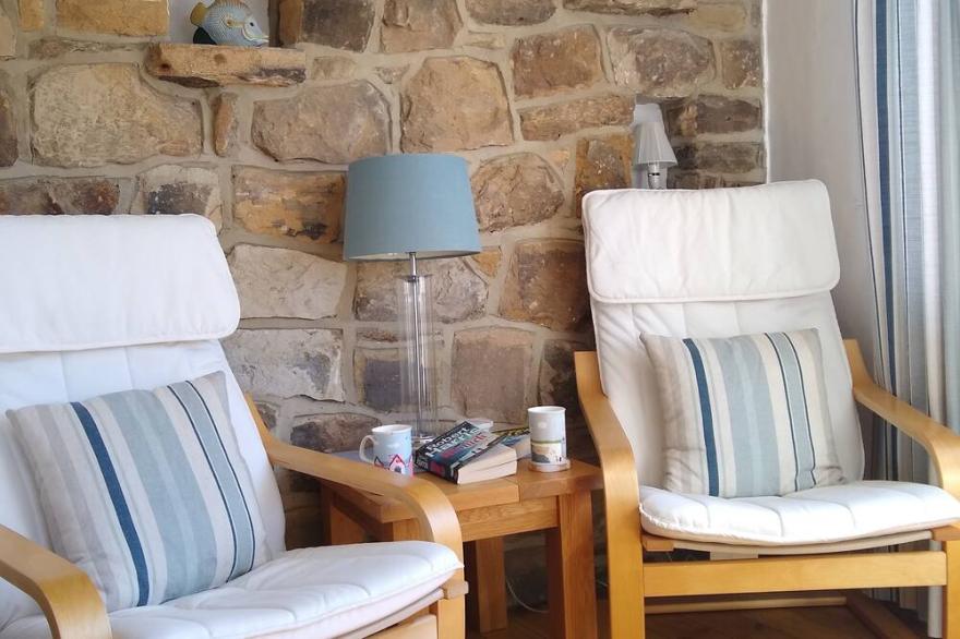 Cottage With Stunning Views Across Whitby Harbour And The North York Moors.