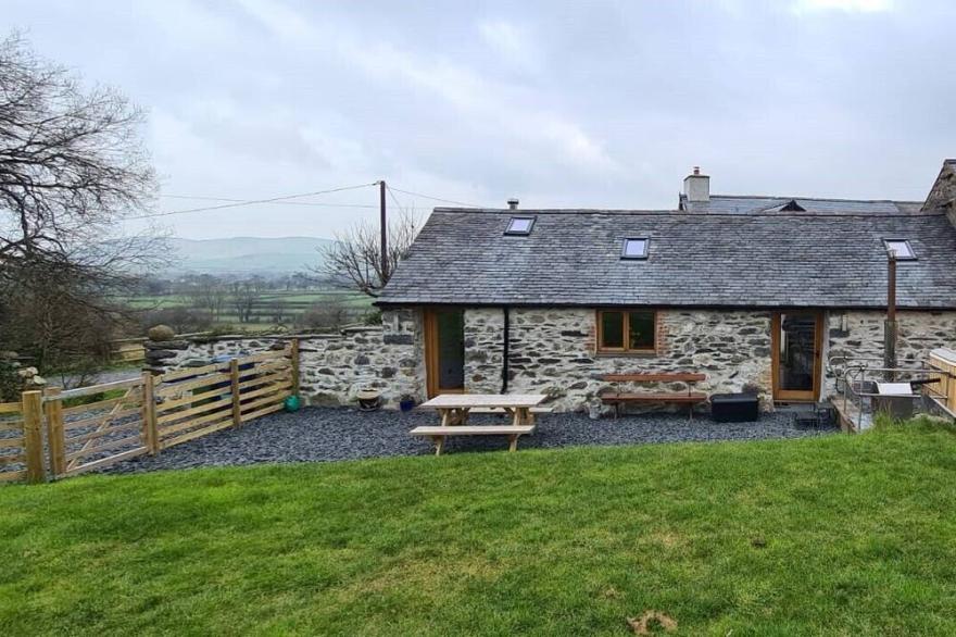 Snowdonia lodge with sea and mountain views