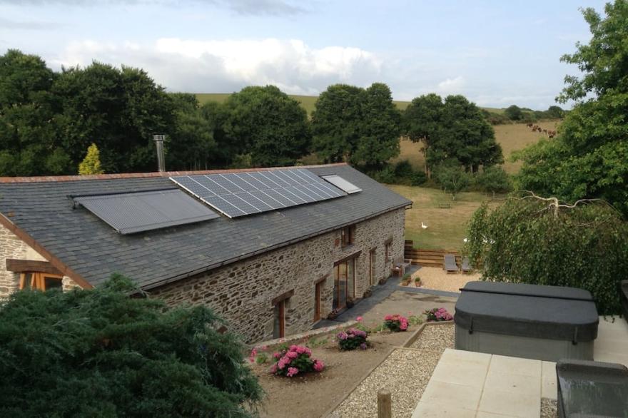 Stunning Barn Conversion with Indoor Pool, tranquil setting, coastal location.