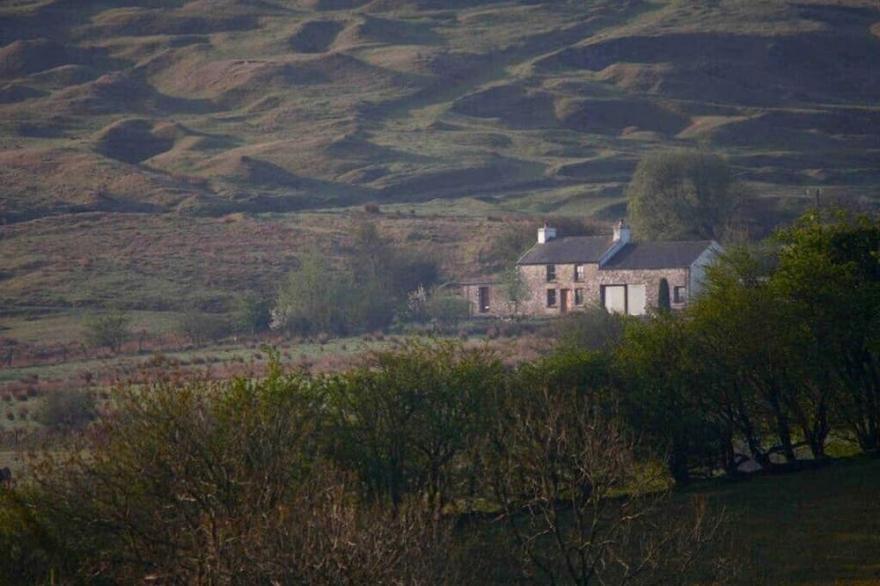 Wildhaven, A beautifully refurbished and unique 250 year old remote Welsh farmhouse perched on a mou