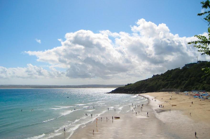 A stunning ground floor apartment with a large outdoor terrace and sea views.