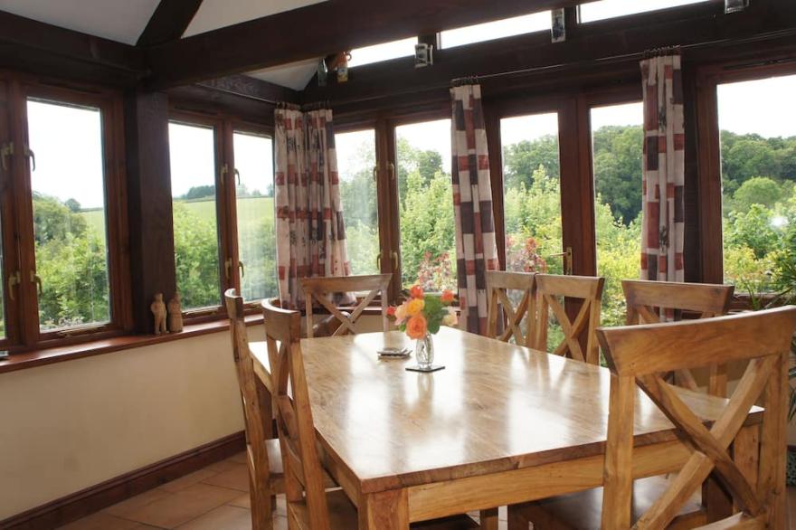 Family House in the country with lovely views and wood fired hot tub