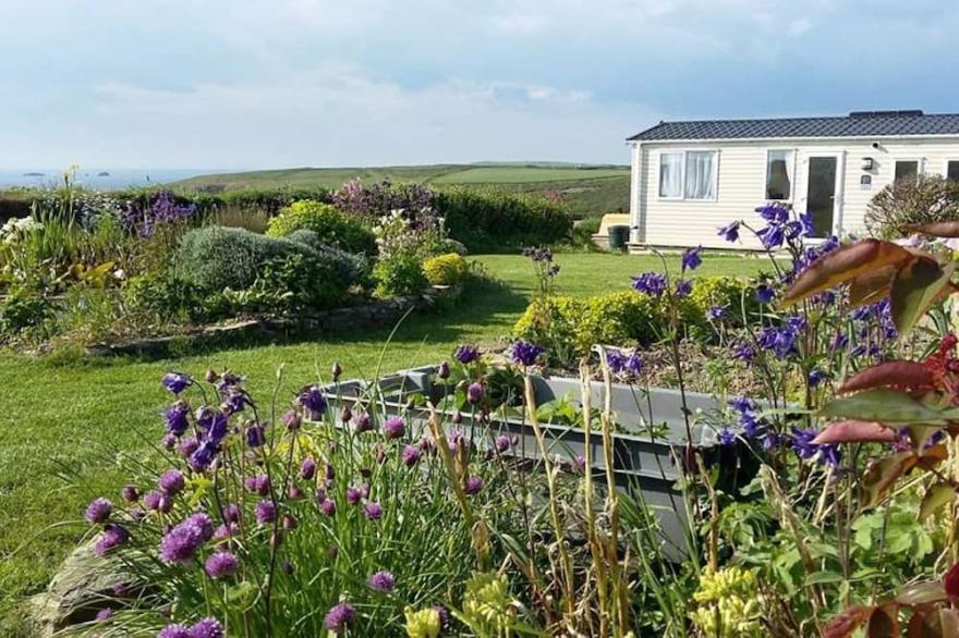A caravan that sleeps 6 guests  in 2 bedrooms