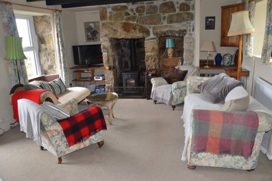 Traditional granite cottage above Sennen Beach