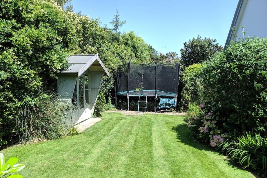 Luxury seaside home with beautiful south facing garden on private sea estate.