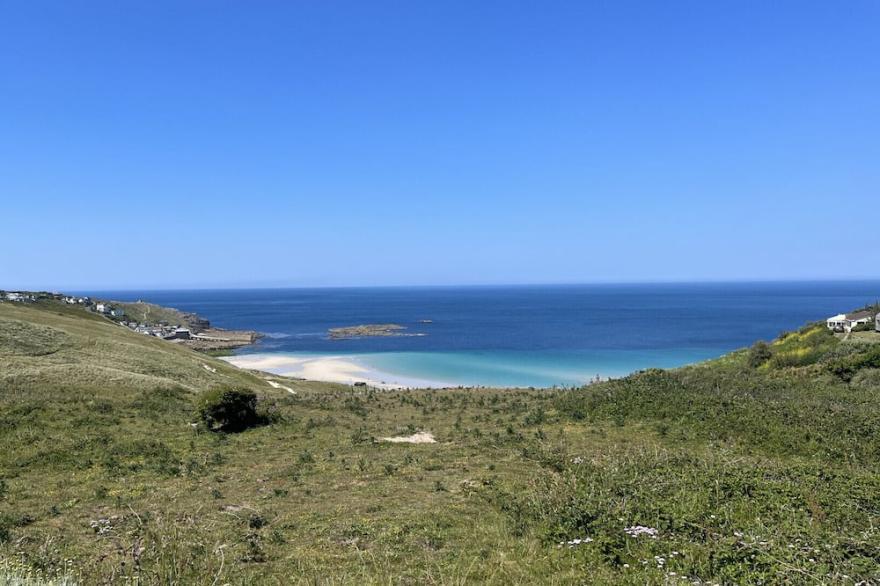 Sennen Cottage, a spacious older style bungalow with panoramic views over Sennen Cove
