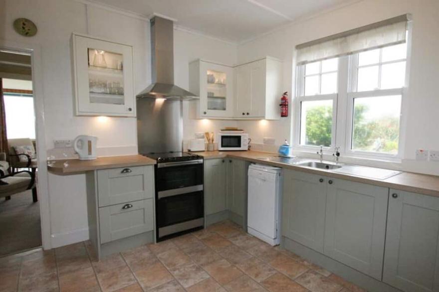 Sennen Cottage, a spacious older style bungalow with panoramic views over Sennen Cove