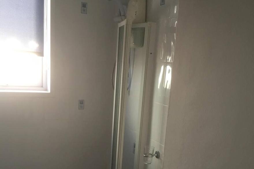 Paignton Seaside Apartment with heated outdoor pool and secure parking.