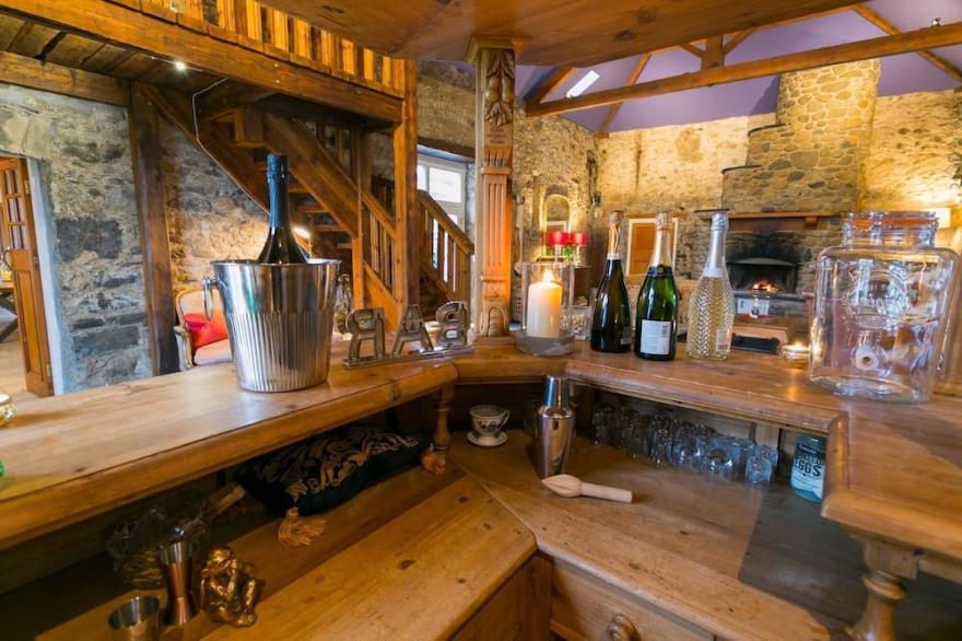 Tal Y Bont Uchaf Stables -  a hot tub that sleeps 16 guests  in 5 bedrooms