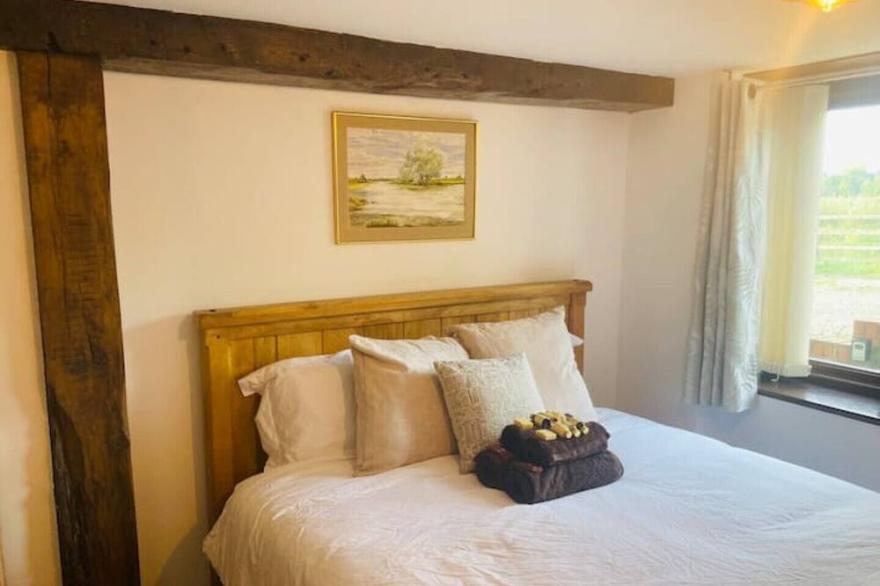 River Avon Retreat - A Rustic Gem on The Riverbank