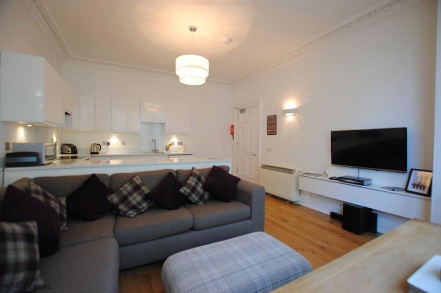 A beautiful 3 bedroomed apartment overlooking university playing fields