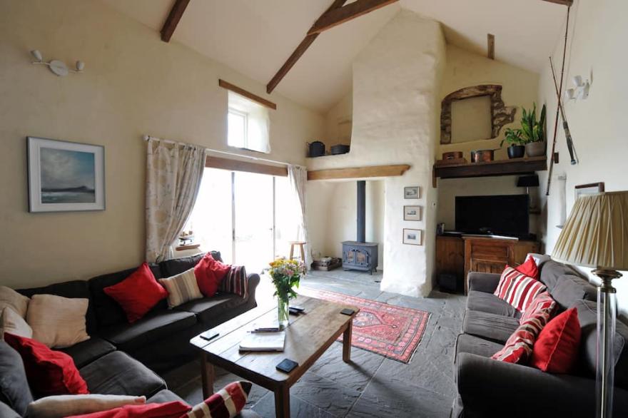 Stunning sea views, idyllic characterful farmhouse with log burner and jacuzzi