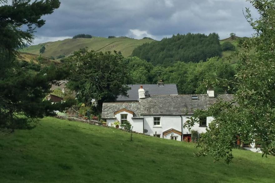 CHARACTERFUL LAKELAND COTTAGE  .  WIFI,SKY TV, LOG FIRES, PRETTY LOCATION.