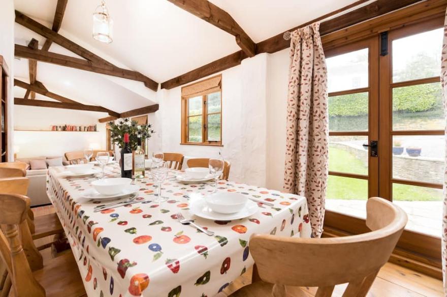 Stunning Three Bedroom Barn Conversion Sleeps 6, takes pets. Near beaches and Exmoor.