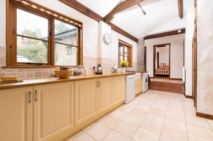 Stunning Three Bedroom Barn Conversion Sleeps 6, takes pets. Near beaches and Exmoor.