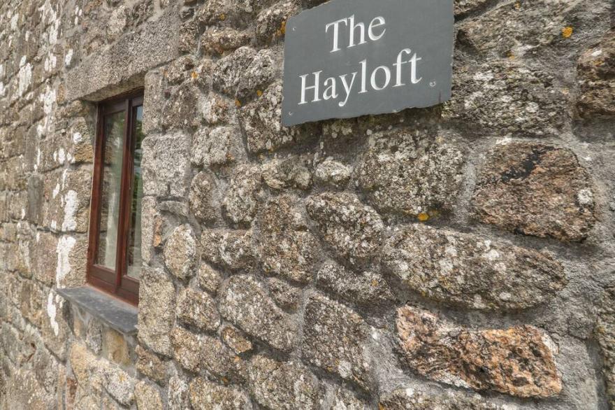 THE HAYLOFT, pet friendly, character holiday cottage in St Neot