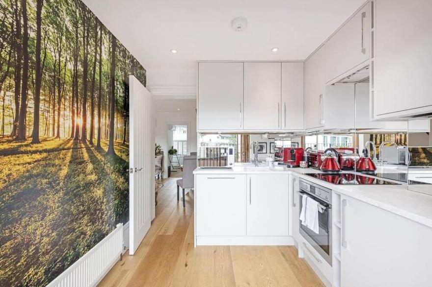 First Floor with SW balcony  by Fulham Broadway