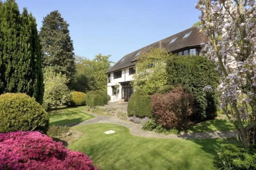 Elegant family home backing into a Golf Course .
