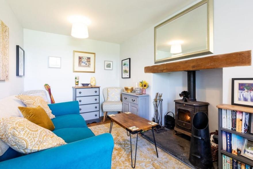 A cosy cottage full of character, comfort & style...