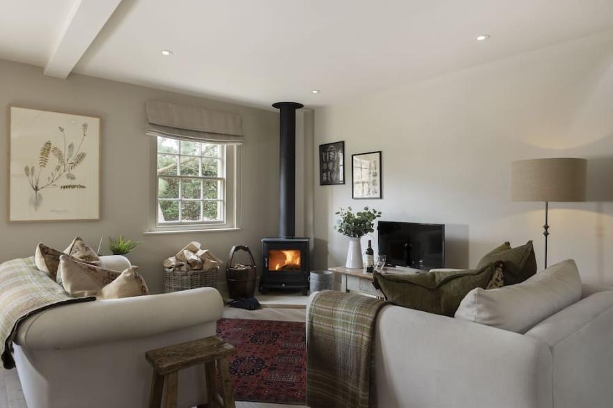 Perfect for a romantic getaway, The Hideaway has a cosy wood-burning stove, a beautiful well-equippe