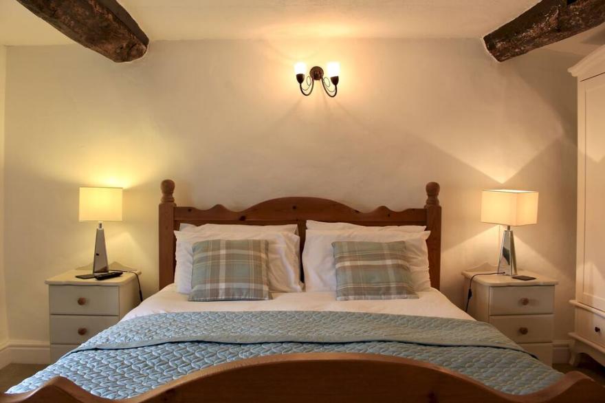 Romantic one bedroom cottage, packed full of original features with log burner.
