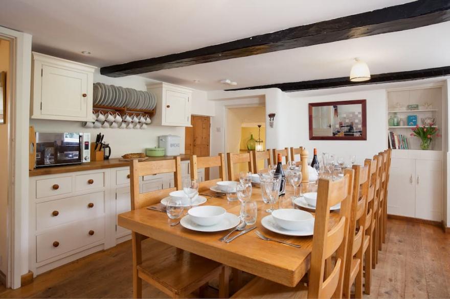 Thatched Devon longhouse, close to sea, with private indoor swimming pool.