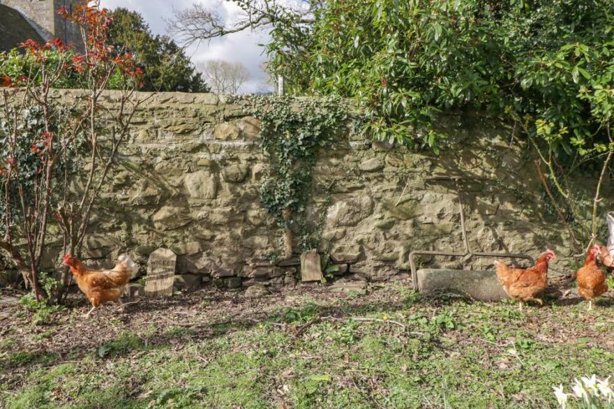 RECTORY COTTAGE, pet friendly, with a garden in Abergavenny