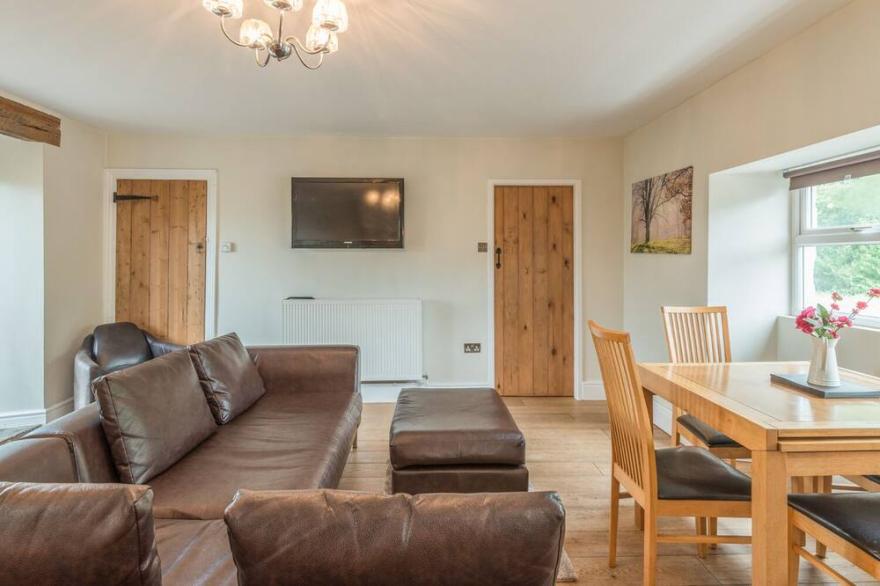 RYEHILL FARM COTTAGE, pet friendly, with open fire in Thropton