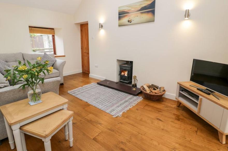 TY TAID, with open fire in Llanddaniel Fab